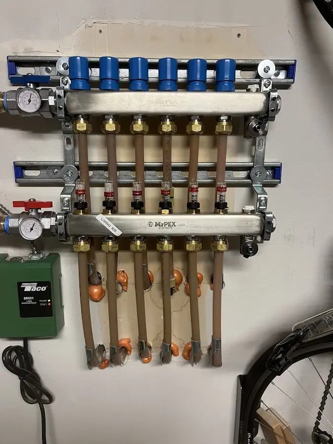 Plumber performing Water Heater Repair at a residential property in Abington